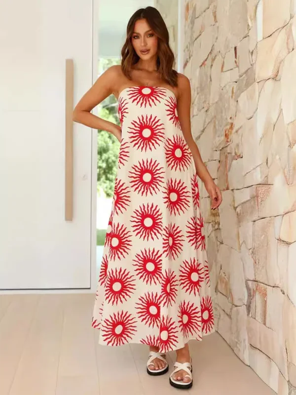 Cream strapless maxi dress in vibrant prints, designed with flowing fabric for a relaxed fit.