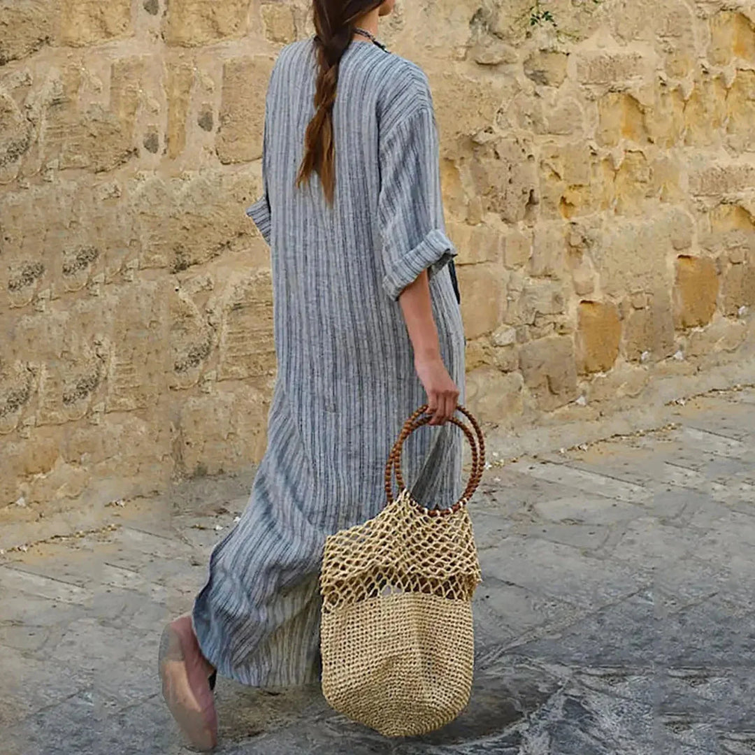 "Sierra striped V-neck maxi dress in soft fabric, with convenient pockets and flattering design."