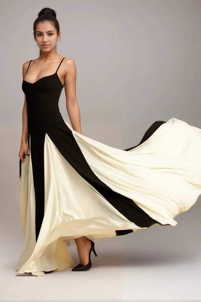 "Black cream panel dress with spaghetti straps, made of soft, lightweight fabric, perfect for a chic and elegant look."