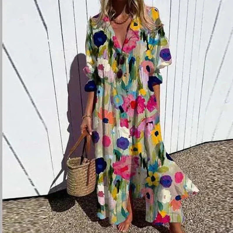 "V-neck floral maxi dress with sleeves in lightweight chiffon fabric, perfect for summer days or a special occasion."