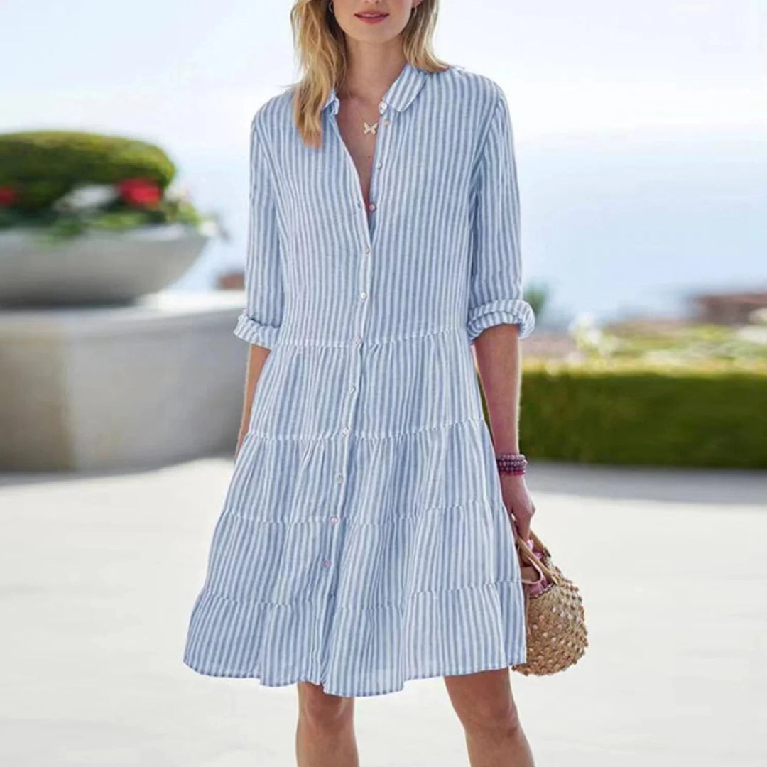 Blue striped mini dress with button-front detailing and a detailed waist, perfect for a casual day out.