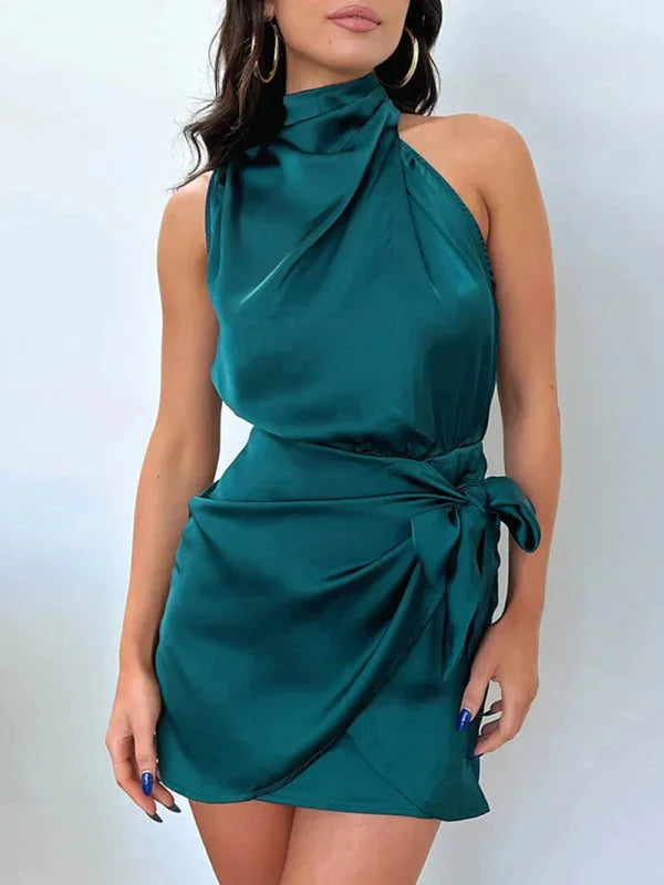 Deep green mini dress with cowl neck, elegantly designed, perfect for any occasion.