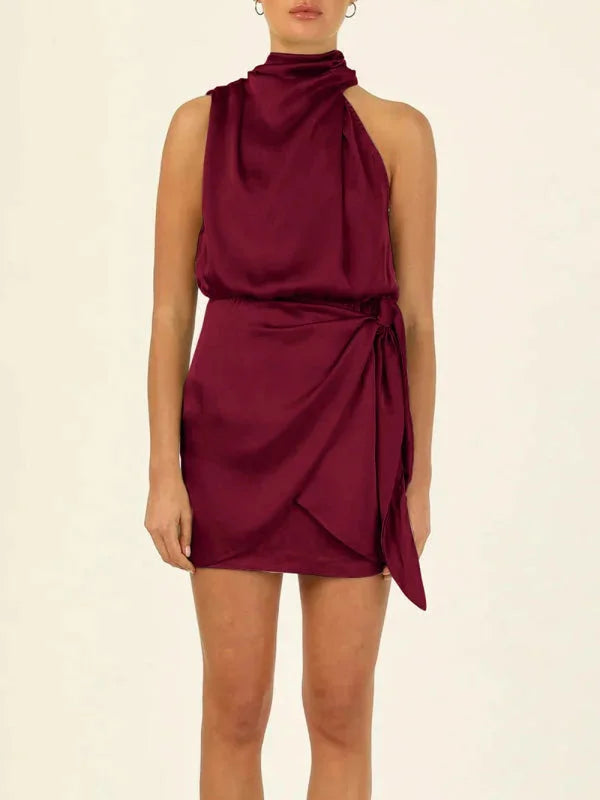 Khaki mini dress with cowl neck, perfect for any occasion. Made of soft, drapey fabric with a chic, elegant design.