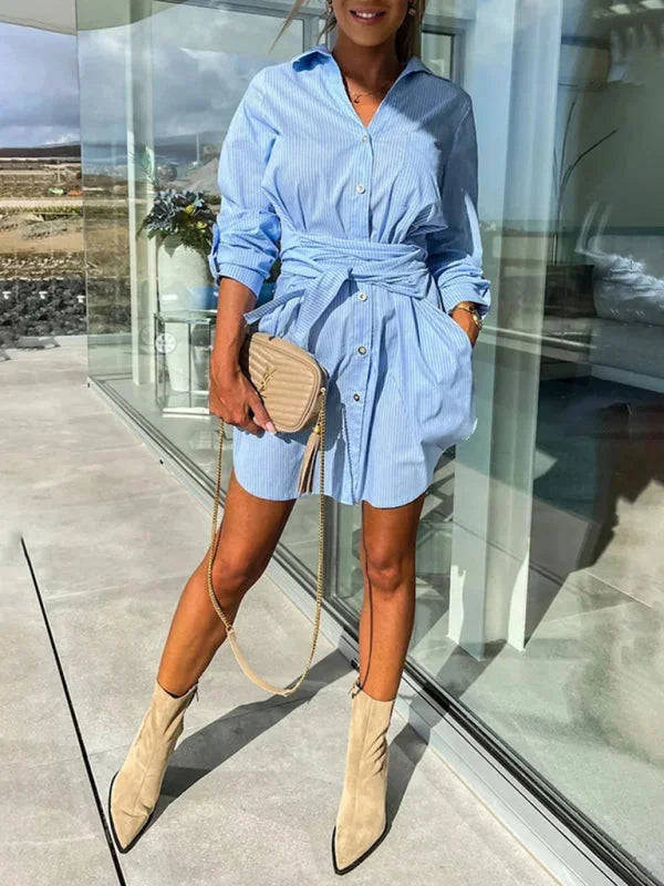 Versatile belted shirt dress with adjustable sleeves in lightweight cotton fabric, perfect for casual and formal occasions.