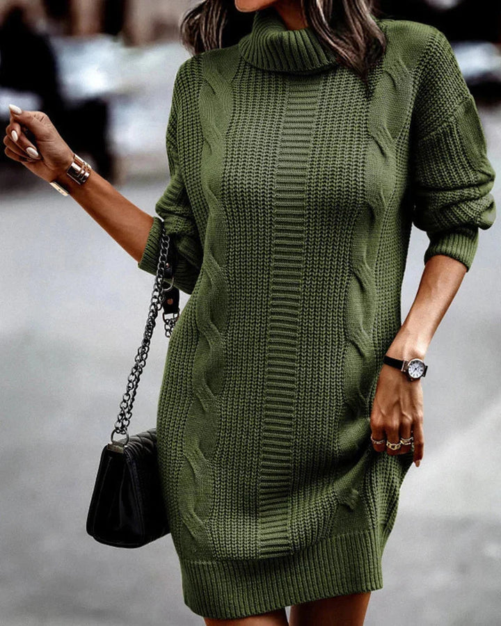 Army green knit sweater dress with turtleneck. Soft and cozy, perfect for chilly days. Subtle cable knit detail adds texture.