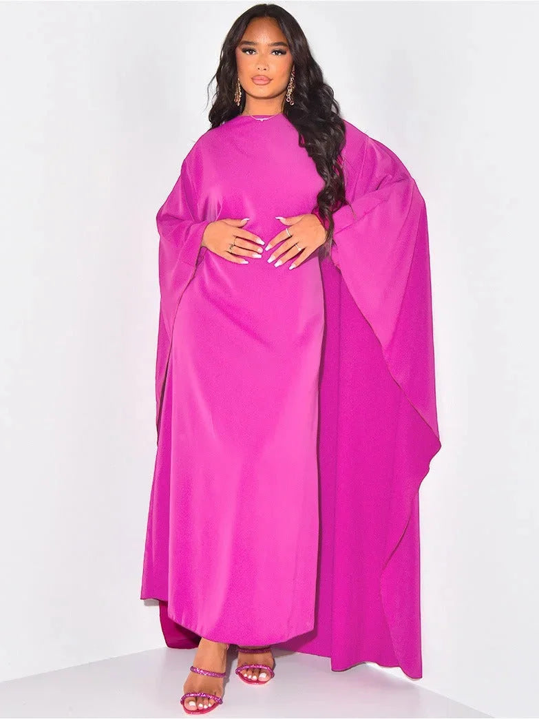 Pink maxi dress with draped sleeves. Soft and flowy fabric. Elegant and stylish design. Perfect for special occasions or…