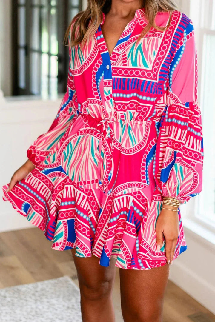 Vibrant pink mini dress with tribal print design, perfect for a stylish and trendy look.