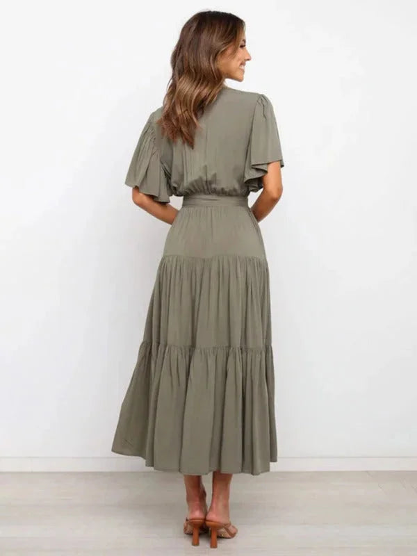 Valentina tiered midi dress in chambray fabric with waist belt and button-front detail.