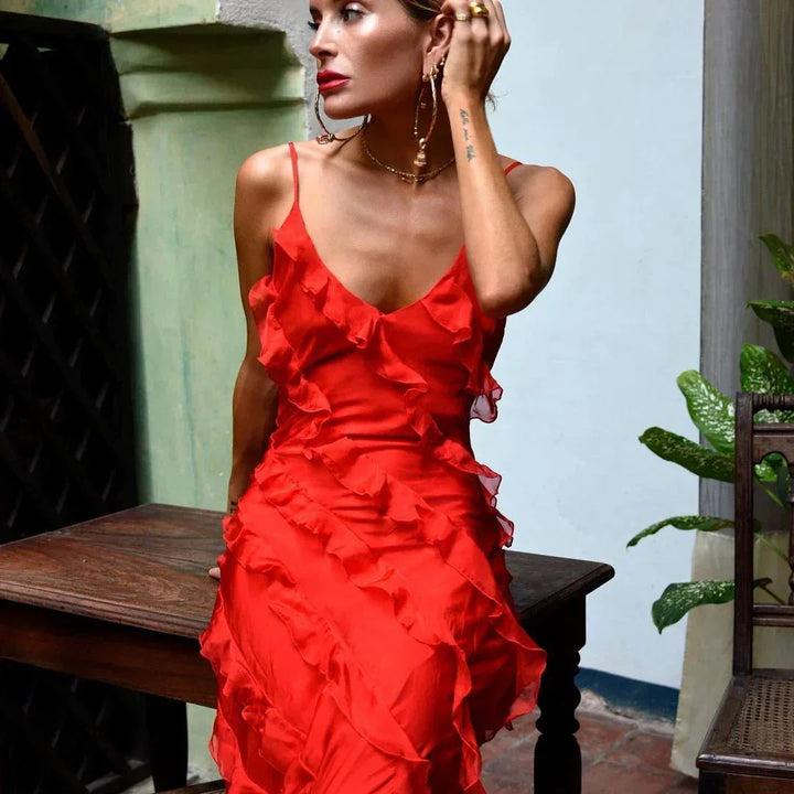 "Viviana elegant ruffled maxi dress with flowing fabric design, perfect for evening events"