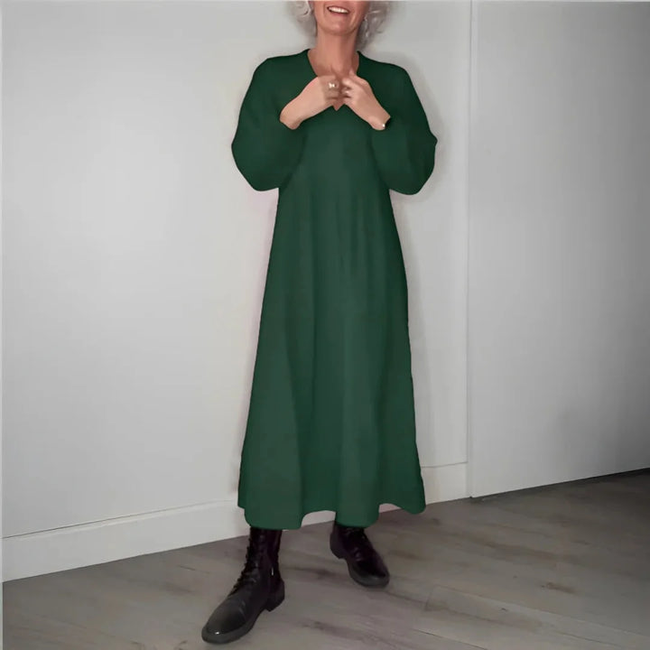 "Green maxi dress with long sleeves and ribbed texture, perfect for cooler weather styling. Versatile and stylish wardrobe…