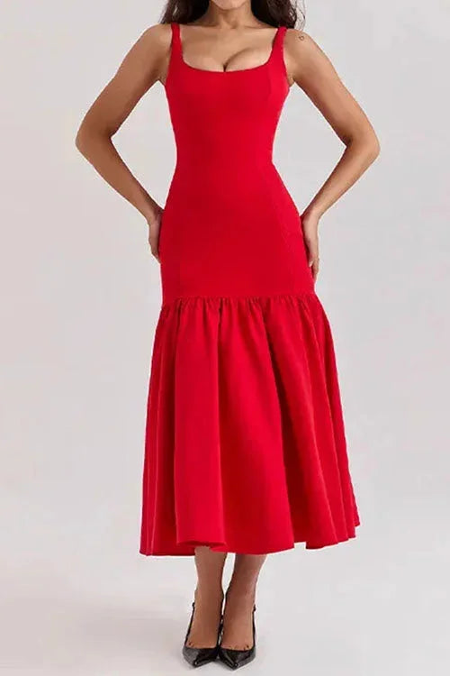 Red sleeveless drop-waist dress with flared skirt, made from soft cotton blend. Perfect for a casual yet stylish look.