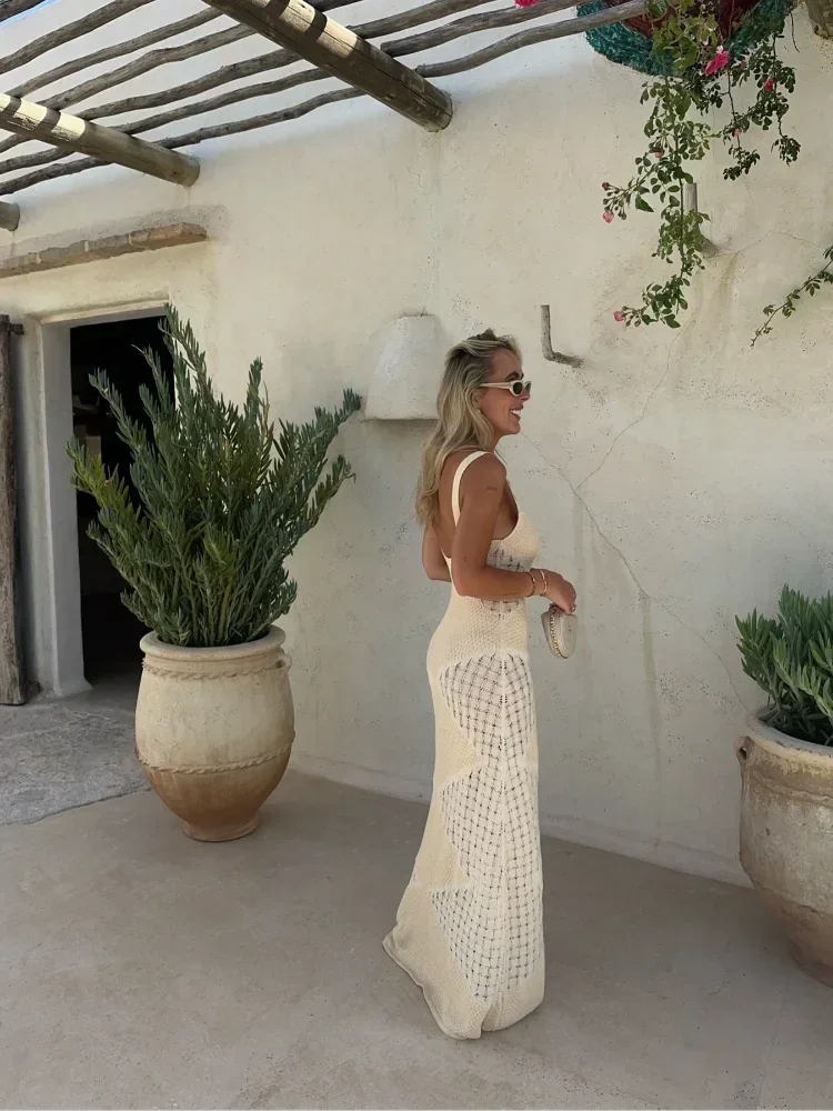 Sleeveless cream knit maxi dress with a unique Zanyla design.