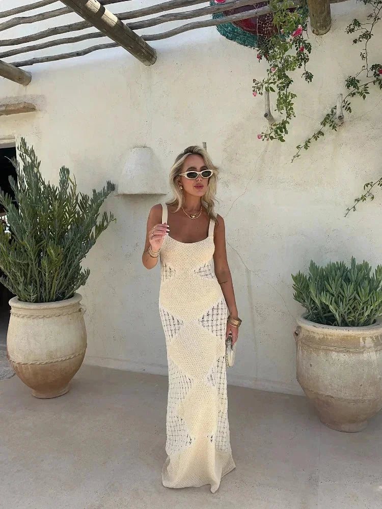 "Sleeveless cream knit maxi dress in Sand by Zanyla, perfect for warm days with a flowy silhouette and stylish design."