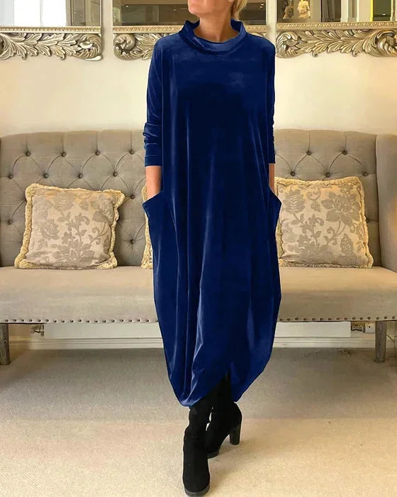 Blue Zoya Velvet midi dress with side pockets, featuring a soft and elegant design perfect for everyday wear.